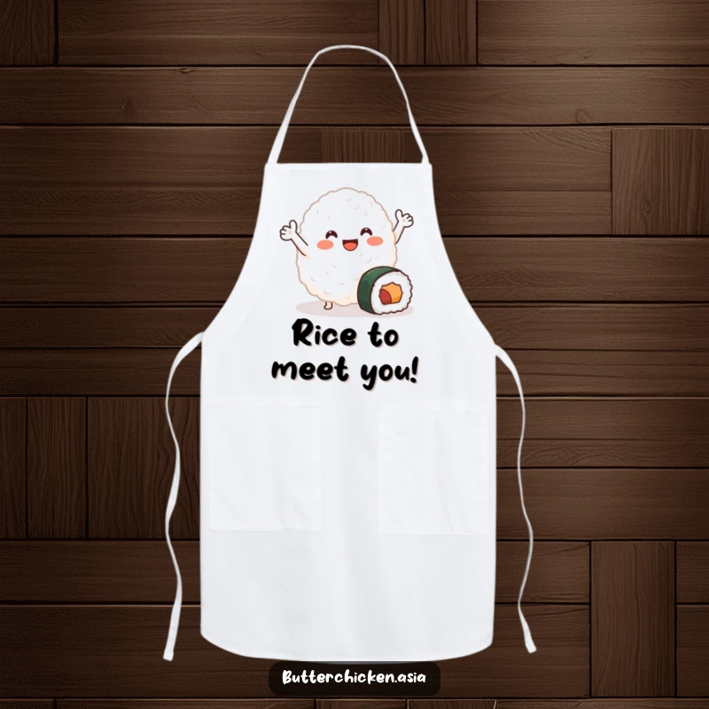 Funny Apron with a smiling blob of rice waving joyfully near a small sushi roll, adding cute food humor and practicality.