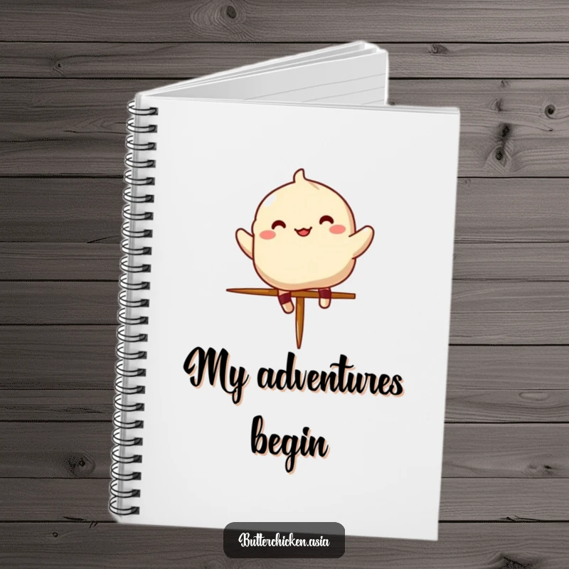 Funny dumpling notebook with a cheerful character energetically jumping over a small chopstick on the cover.