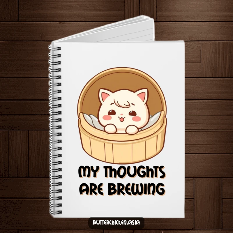 Funny dim sum notebook with a giggling character peeking out from a small bamboo steamer on the cover.